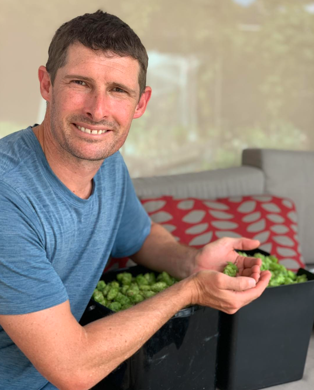 Sam Williamson with fresh hops
